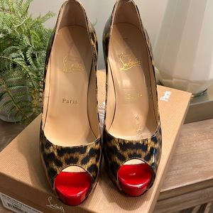 Brown/Red Louboutins.